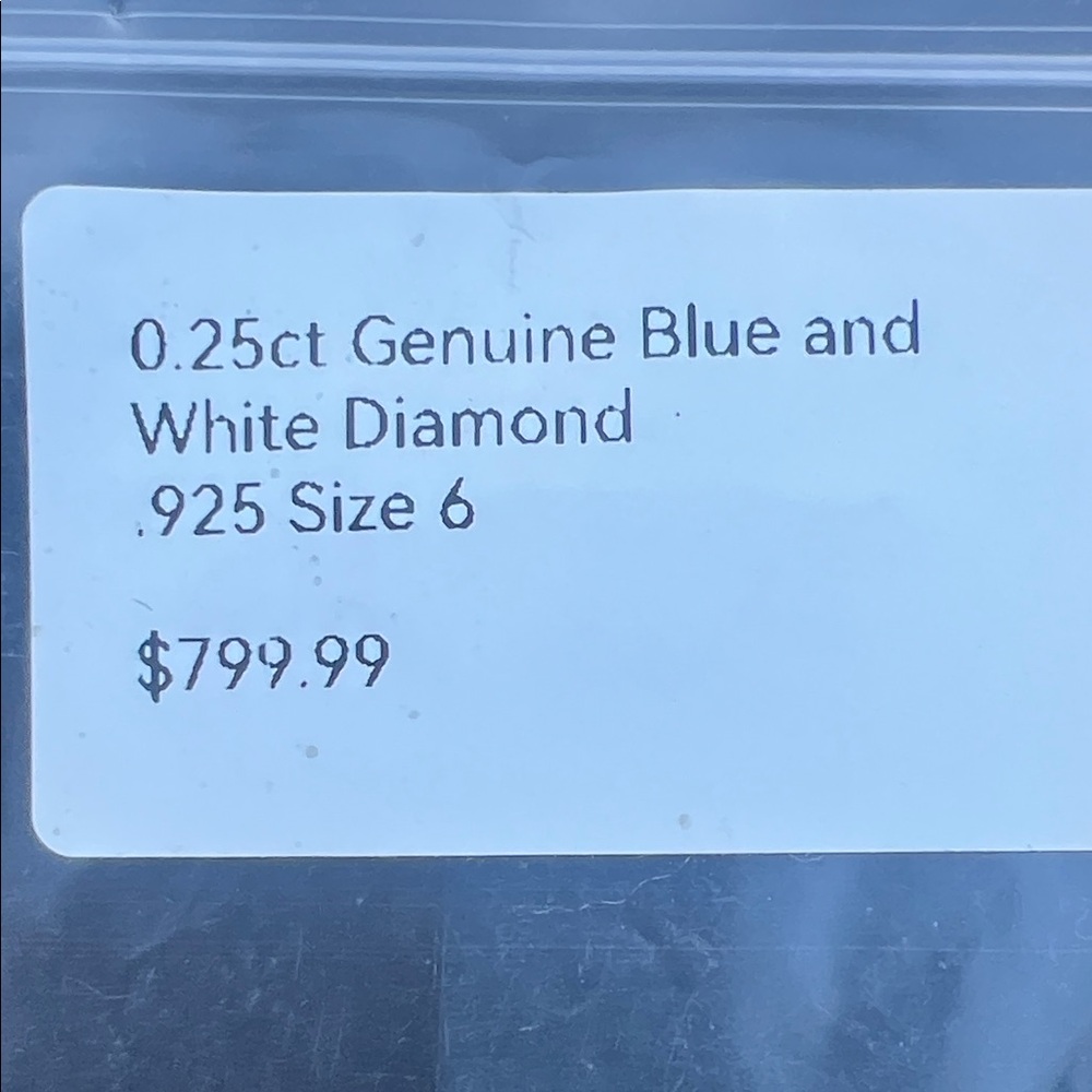 0.25ct Blue and White Diamond Ring
